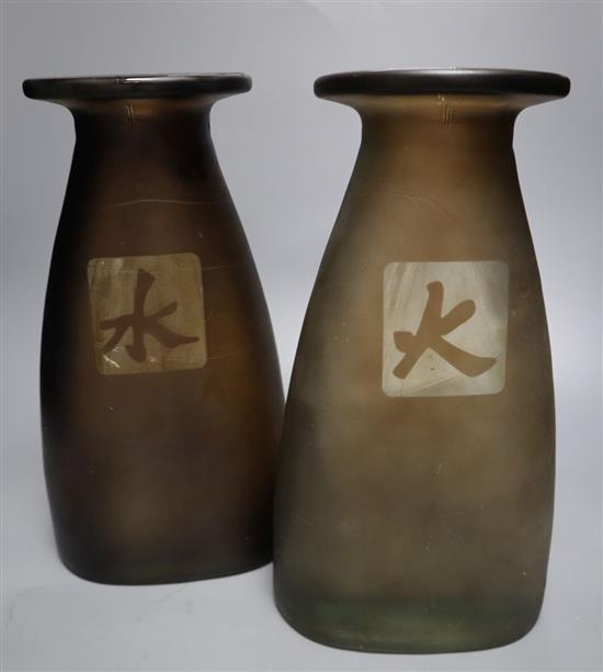 A pair of frosted glass vases bearing Chinese symbols, 31cm high